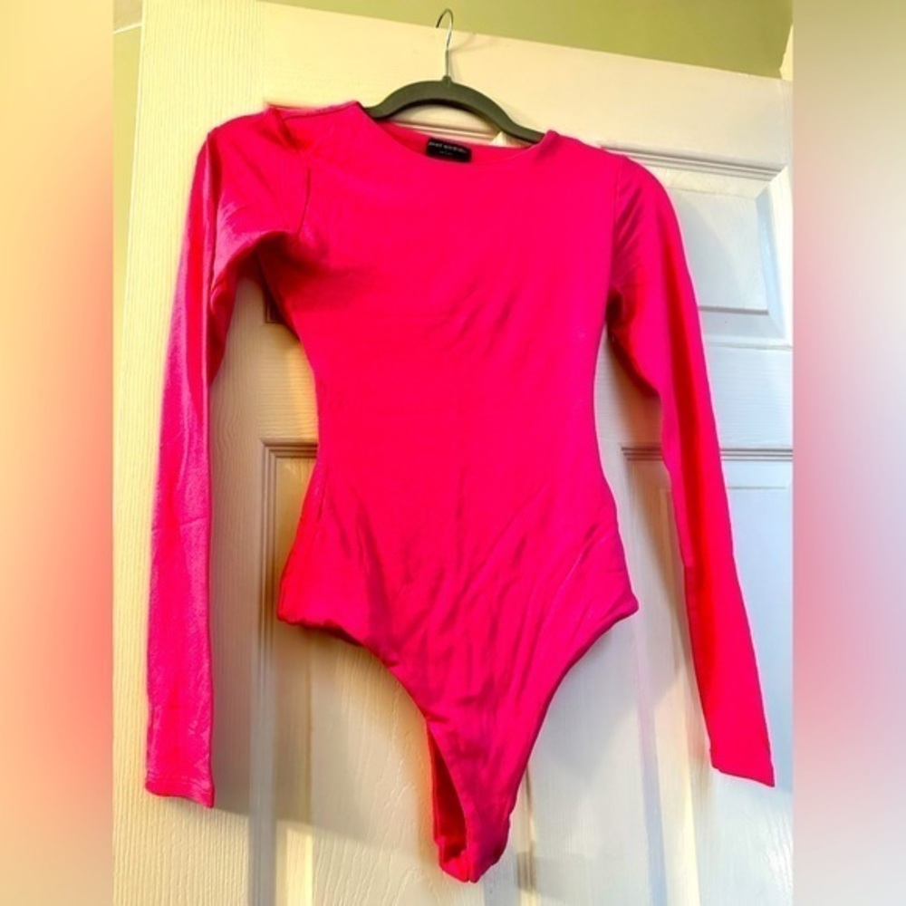 Naked Wardrobe  bubblegum pink bodysuit! Features open back design. NWOT.